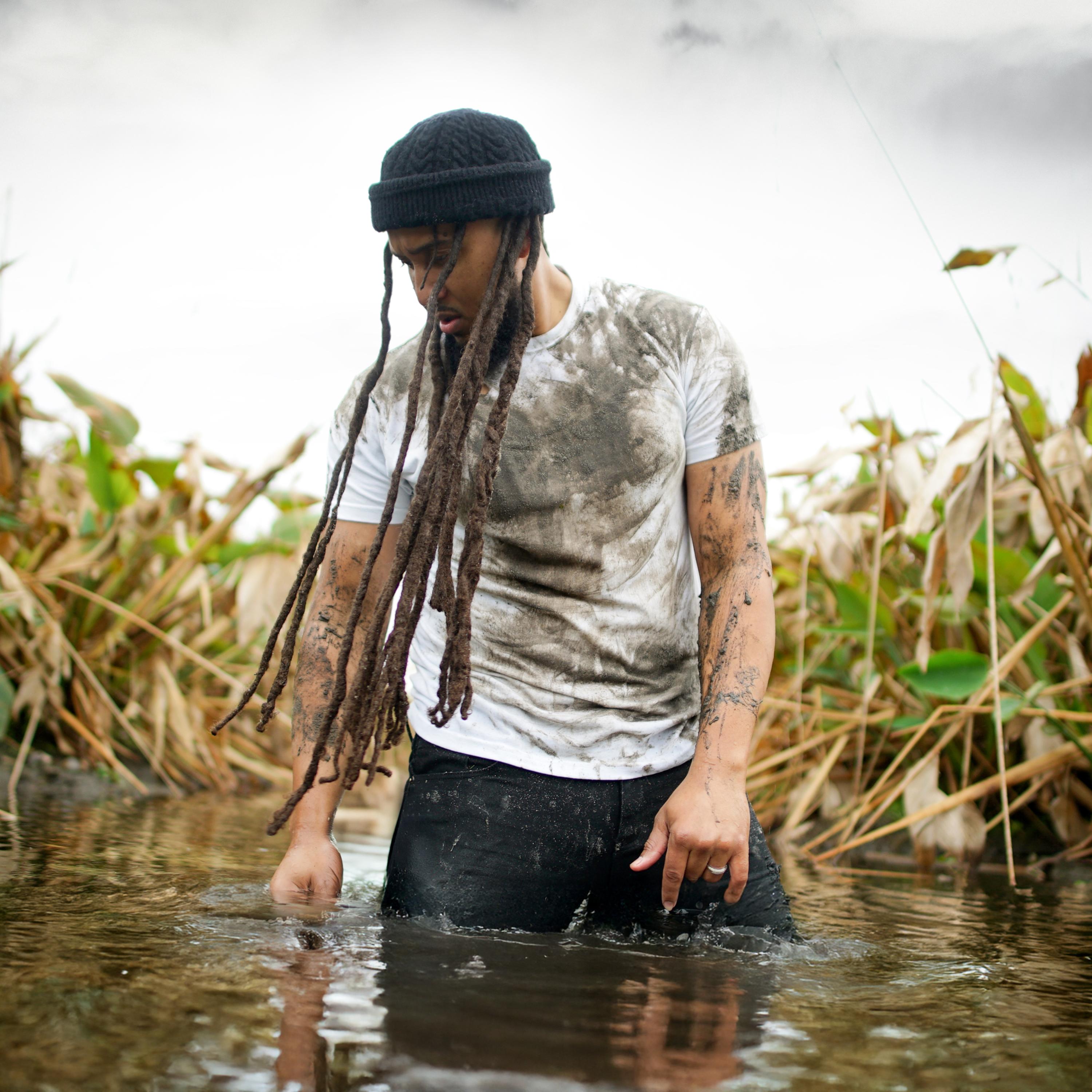 Baptized in Mud artwork