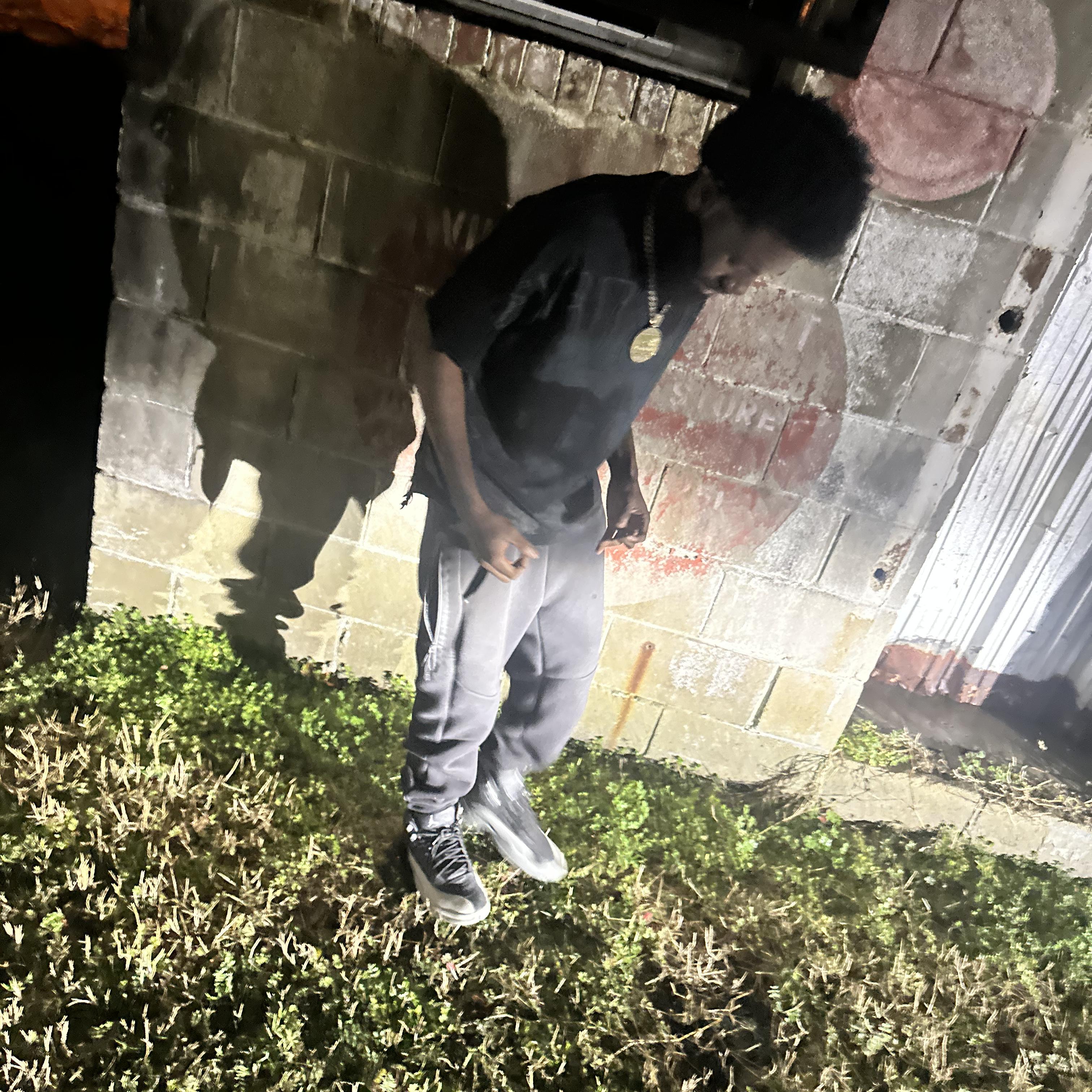 ManiakvsDaWrld artwork