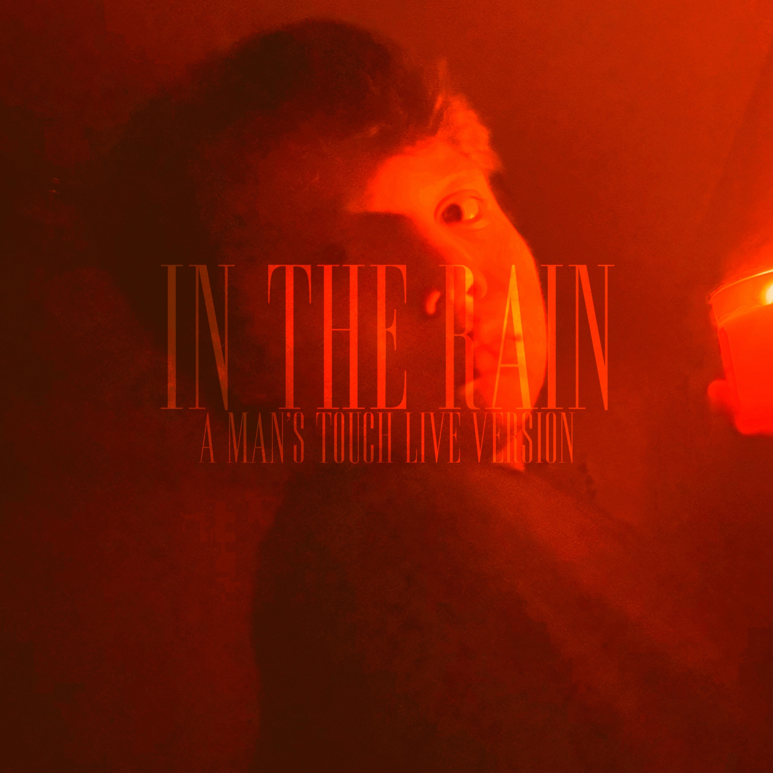 In the rain (A Man’s Touch Live Version) artwork