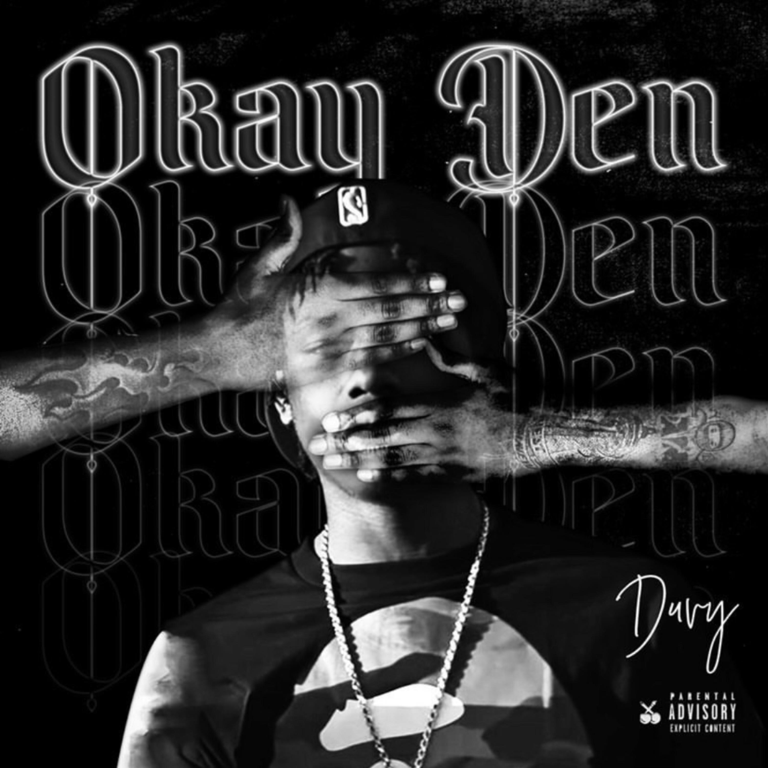 Okay Den artwork