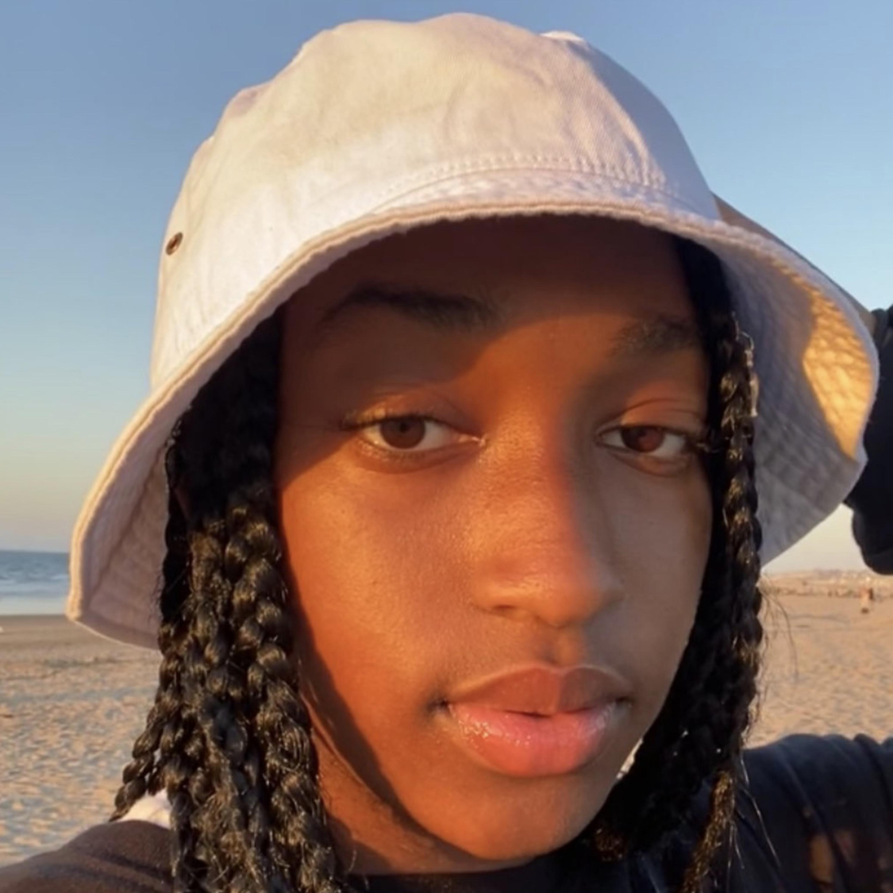 black woman by music X cover art